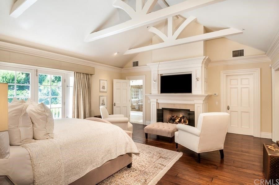 Crown Molding In Master Bedroom
 Traditional Master Bedroom with stone fireplace Hardwood