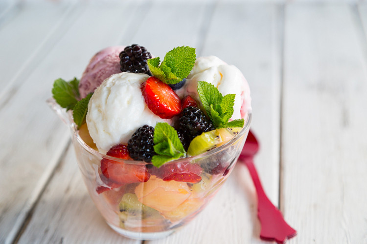 Fruitcake And Ice Cream
 Healthy Frozen Yogurt with Fresh Fruit Salad and Mint