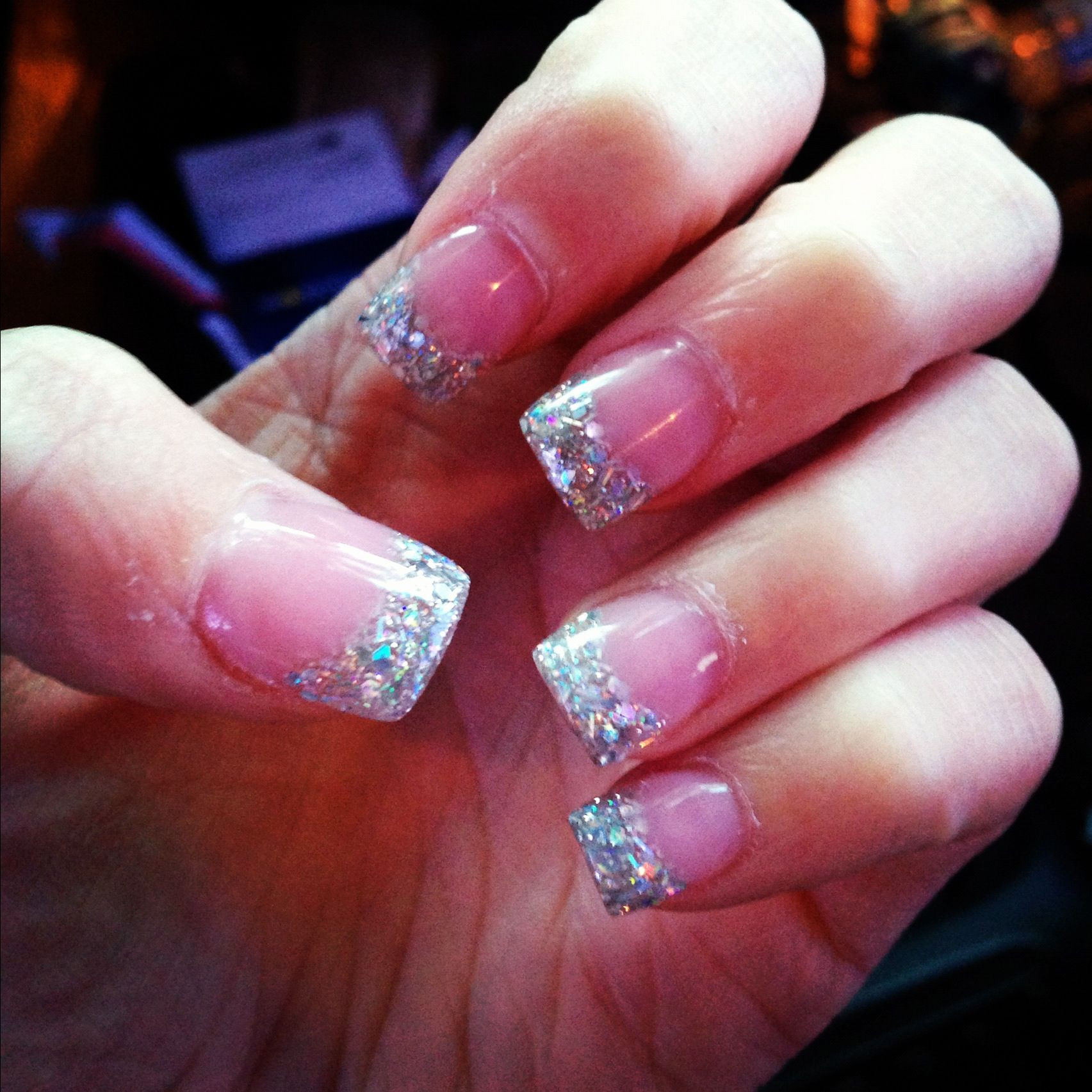 Glitter Tipped Nails
 Pink and white acrylic with glitter tips Beauty