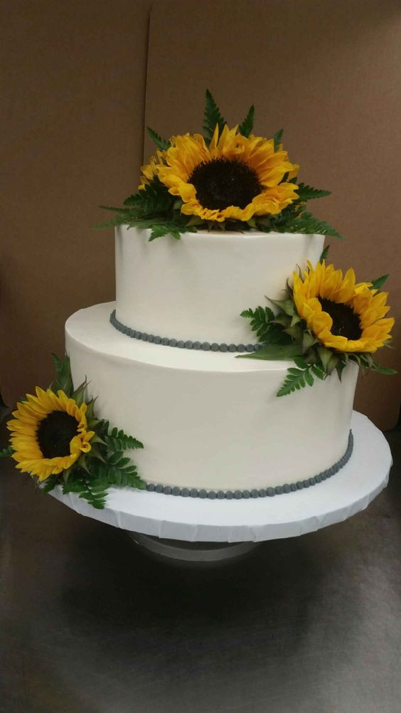 Holiday Market Wedding Cakes
 Vibrant Sunflower wedding cake market