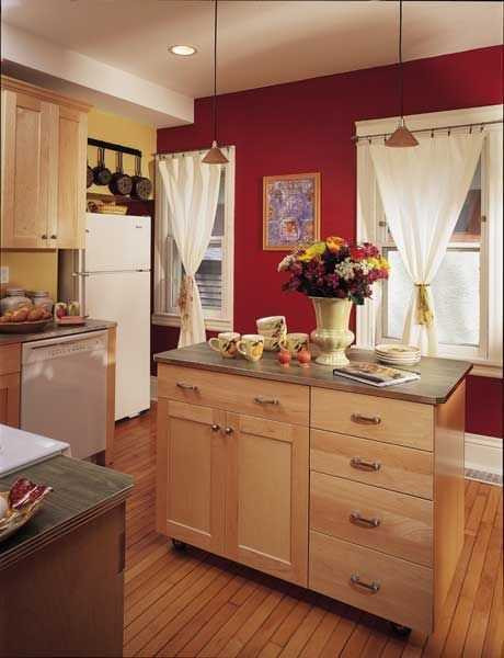 Kitchen With Red Wall
 Kitchen colour for cabinets and islands to fire up your