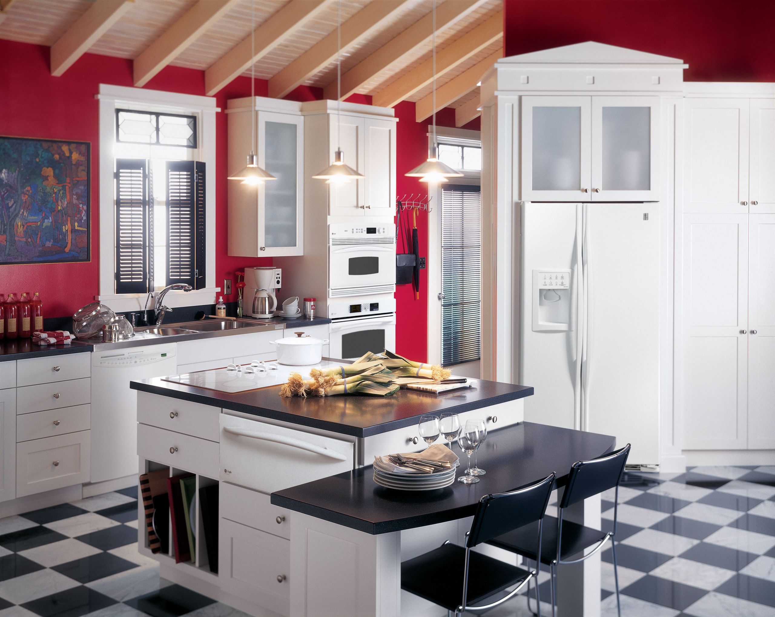 Kitchen With Red Wall
 GE Profile kitchen with red walls white cabinets and