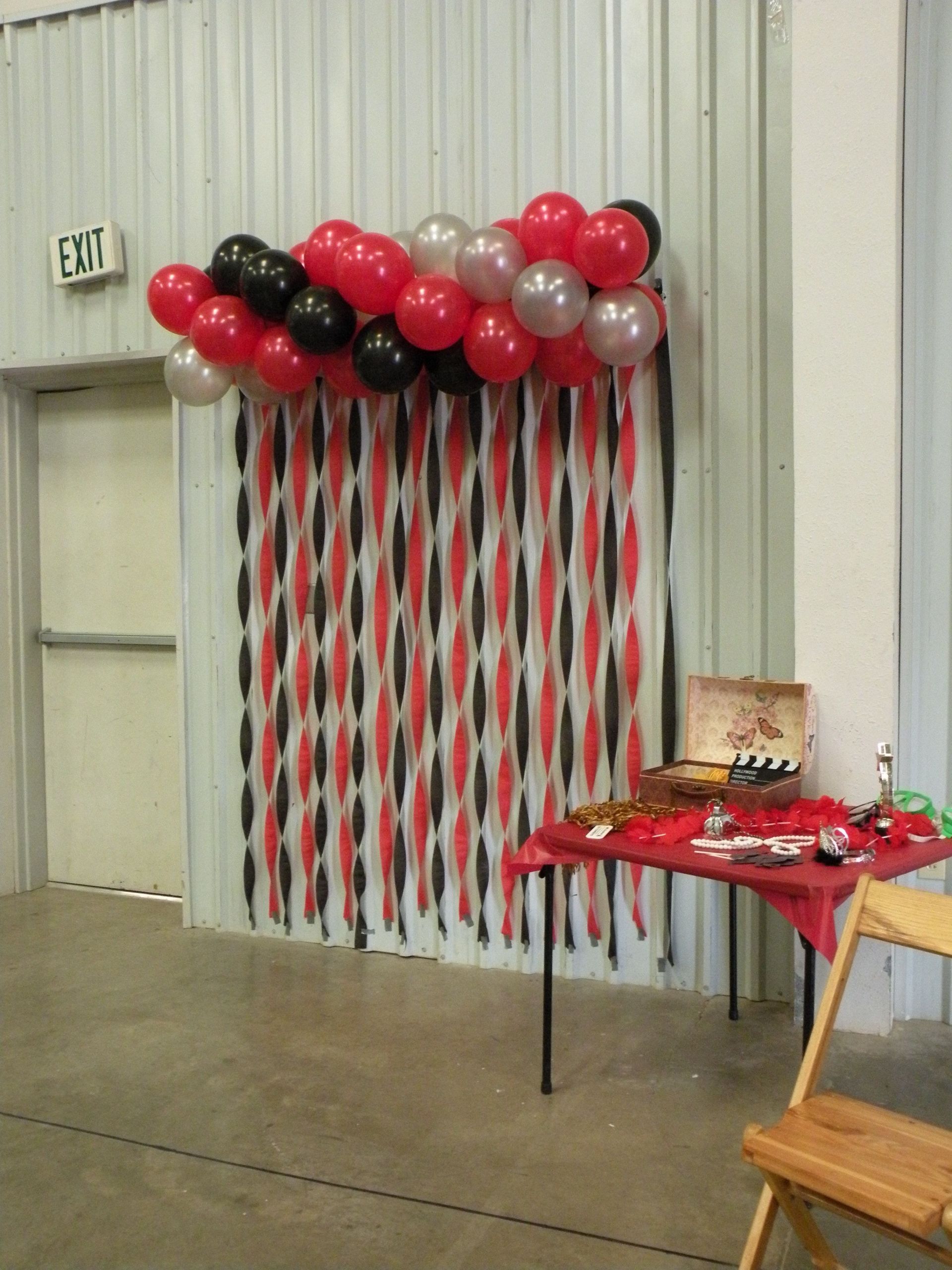 Red And White Graduation Party Ideas
 Balloon and streamers photo booth with props