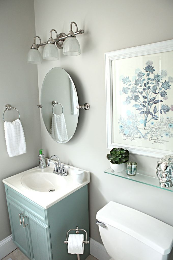 Small Oval Bathroom Mirror
 Simple yet beautiful bathroom House of Turquoise Bower