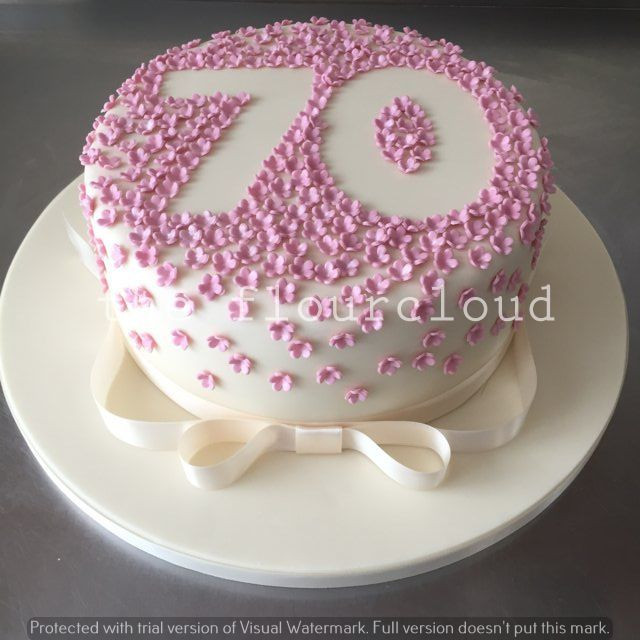 70th Birthday Cake Ideas
 Pretty pink flowers outline for this 70th birthday cake