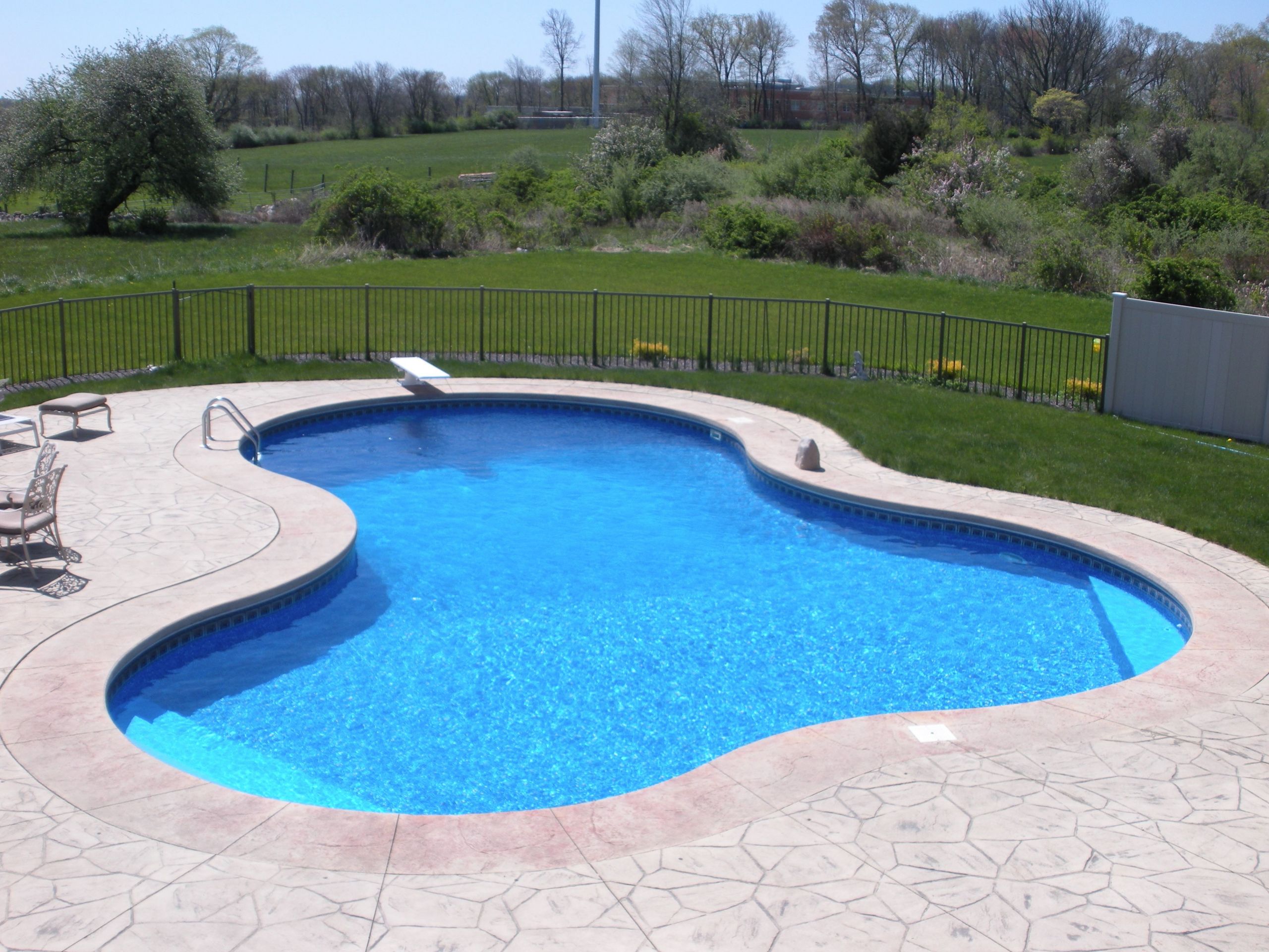 Above Ground Pool Shapes
 Lagoon Shaped In ground pool Backyard