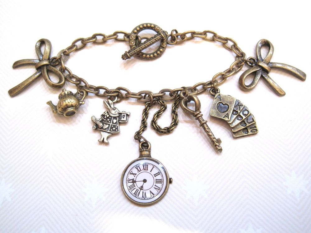 Alice In Wonderland Bracelet
 ALICE IN WONDERLAND CHARM BRACELET Pocket Watch Key