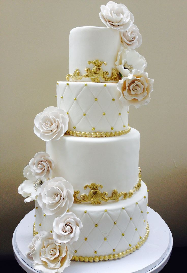 All White Wedding Cakes
 All white wedding cake with gold accents in 2019