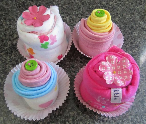 Baby Clothes Cupcakes
 Cupcakes made out of baby clothes cute idea for a baby