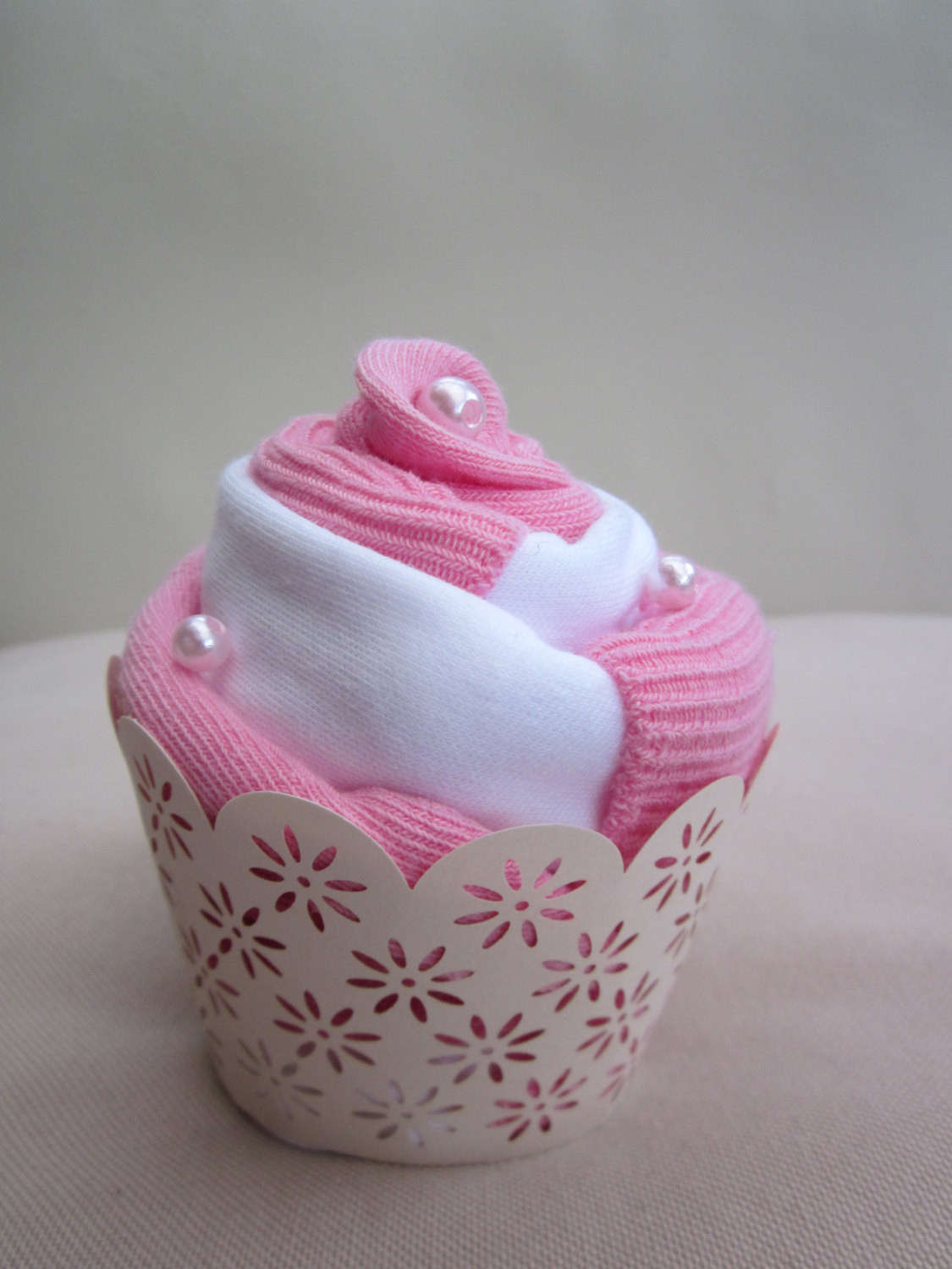 Baby Clothes Cupcakes
 Sweet baby cupcakes made from quality baby clothes Body suit