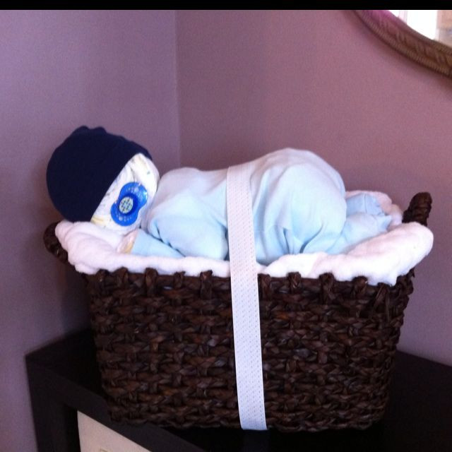 Baby Shower Gifts Made With Diapers
 Baby made out of diapers napping in a basket as an