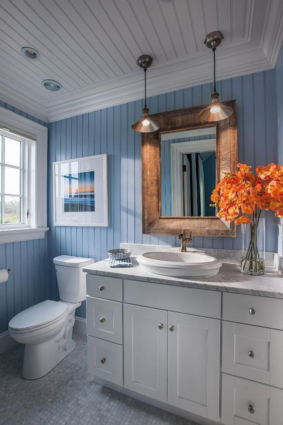 Beadboard Bathroom Walls
 Coastal bathroom with blue and white motif Blue bead