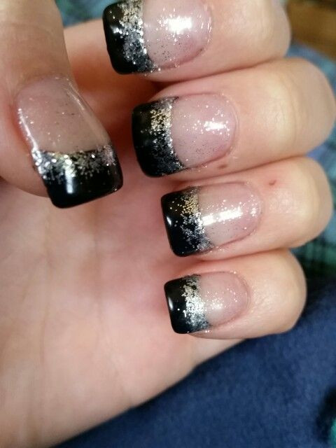 Black Nails With Glitter Tips
 Black french tip with silver sparkly glitter ombre and