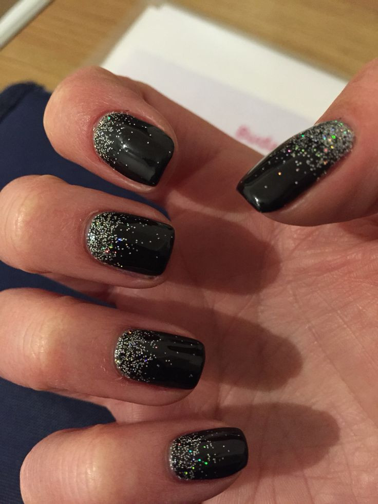 Black Nails With Silver Glitter
 Black shellac silver glitter nails
