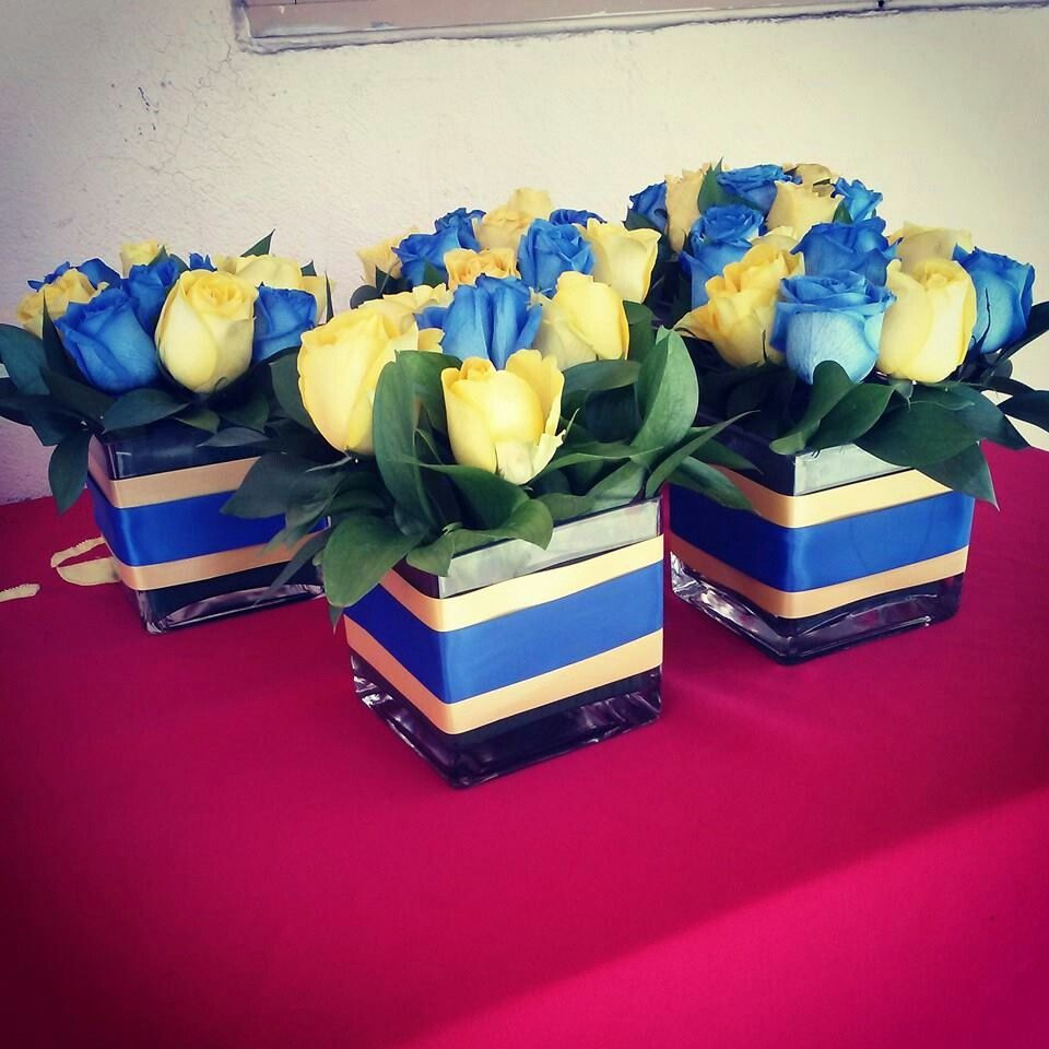 Blue And Yellow Graduation Party Ideas
 Yellow and blue centerpieces for a San Jose State