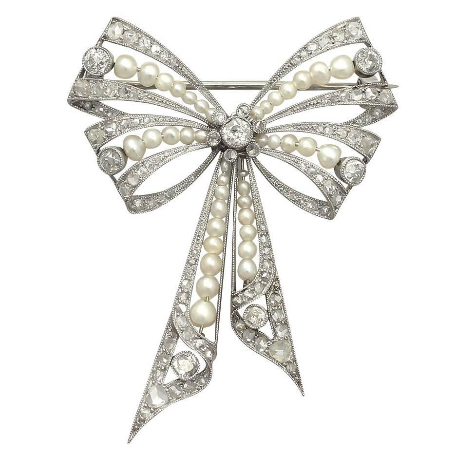 Bow Brooches
 Pearl and 0 68Ct Diamond Platinum Bow Brooch Antique