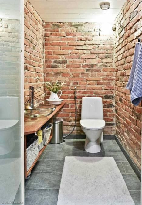 Brick Tile Bathroom
 red brick walls in a toilet