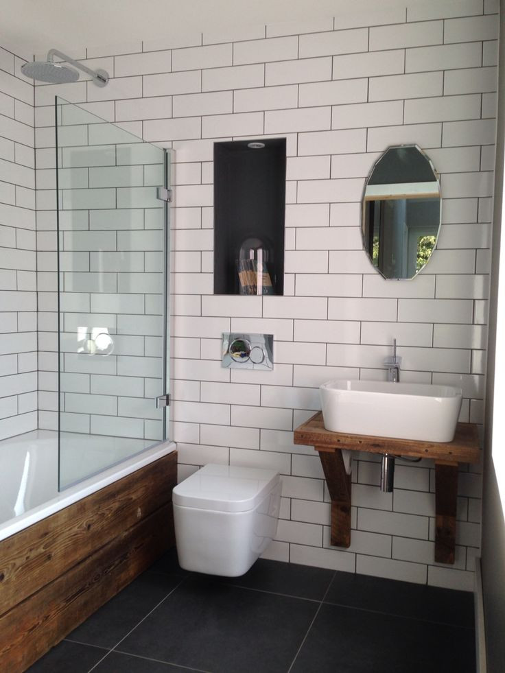Brick Tile Bathroom
 White brick tiles with dark grey grout Scaffold plank