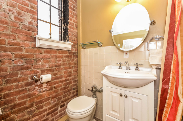 Brick Tile Bathroom
 Exposed Brick Bathroom Traditional Bathroom New York