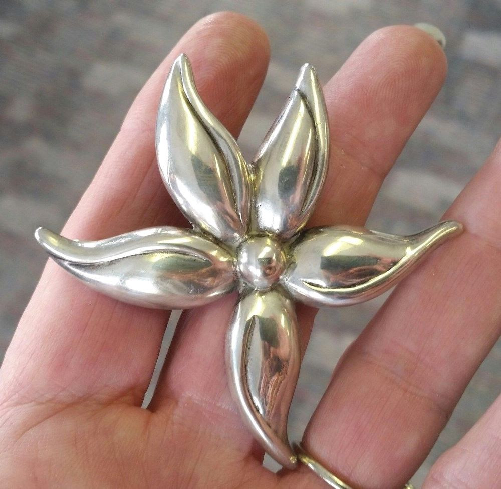 Brooches Design
 Designer signed A Sterling Silver Modern Flower Power Pin