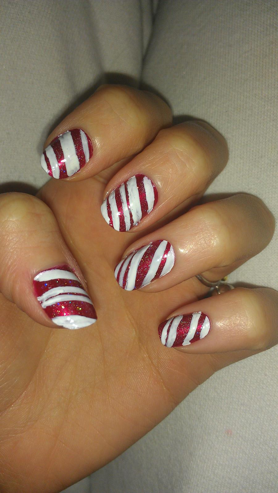 Candy Cane Nail Art
 Candy cane nails by rabbithat8 on deviantART