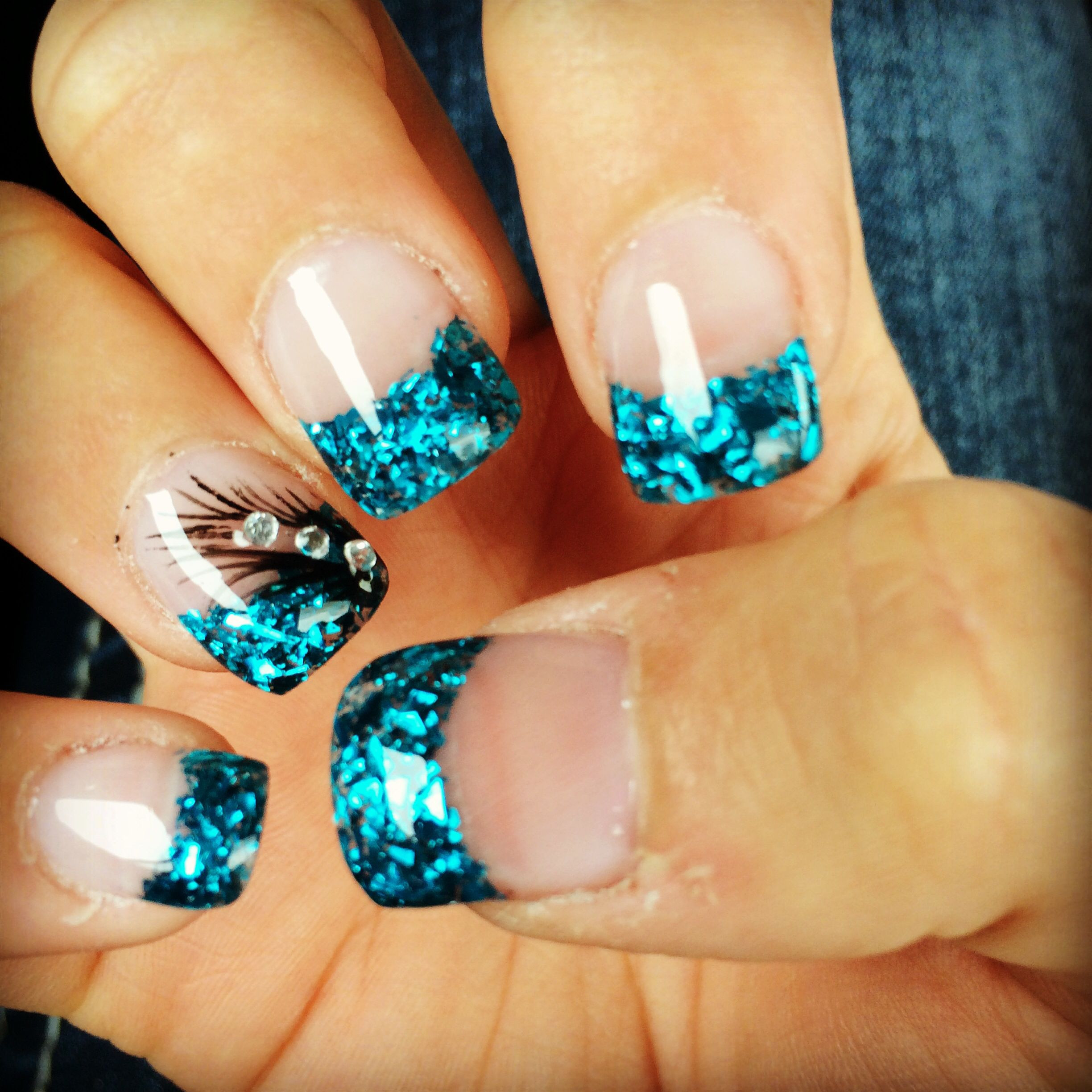 Colored Acrylic Nail Designs
 Colored Acrylic tips with a feather design