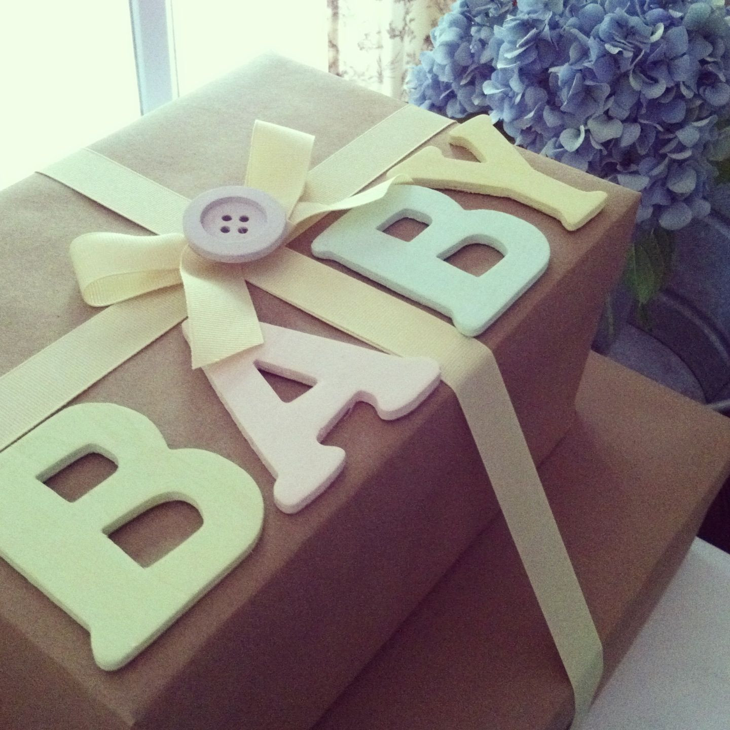 Creative Ways To Wrap A Baby Shower Gift
 Baby Shower t wrapping brownpaper wrapping baby