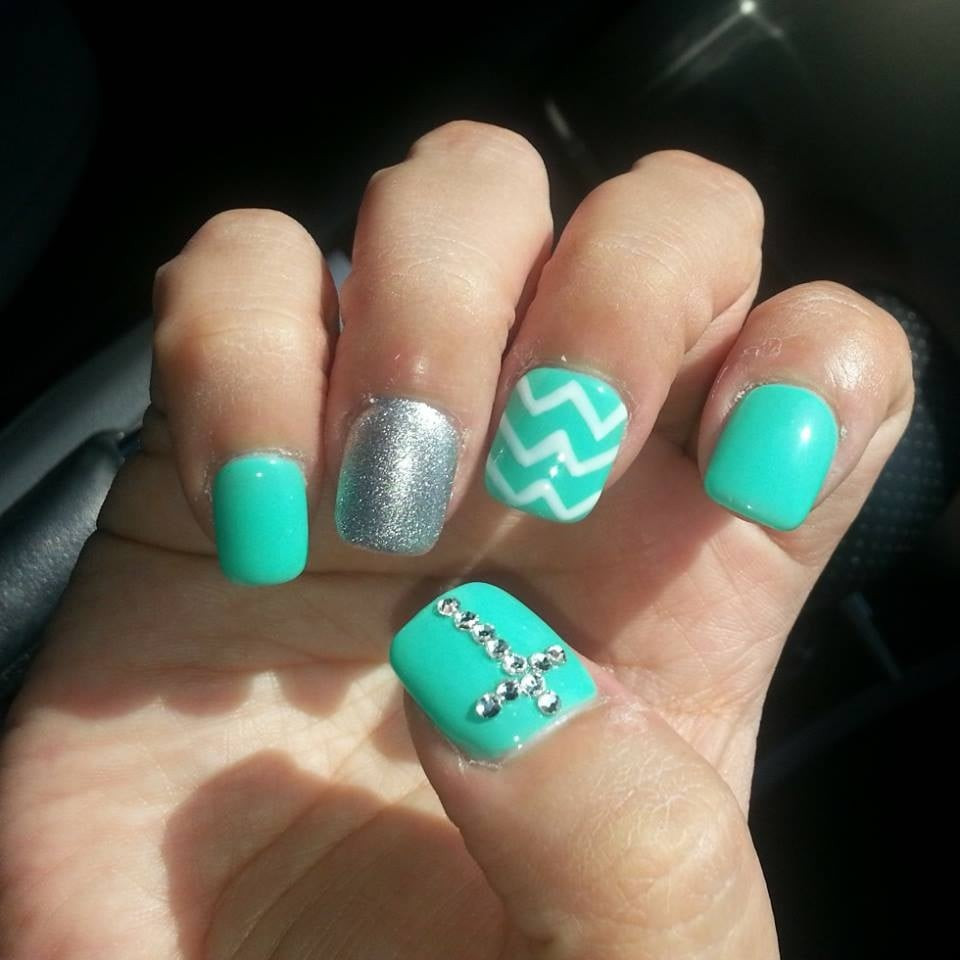 Cross Nail Designs
 Gel nails with chevron design and rhinestone cross I have