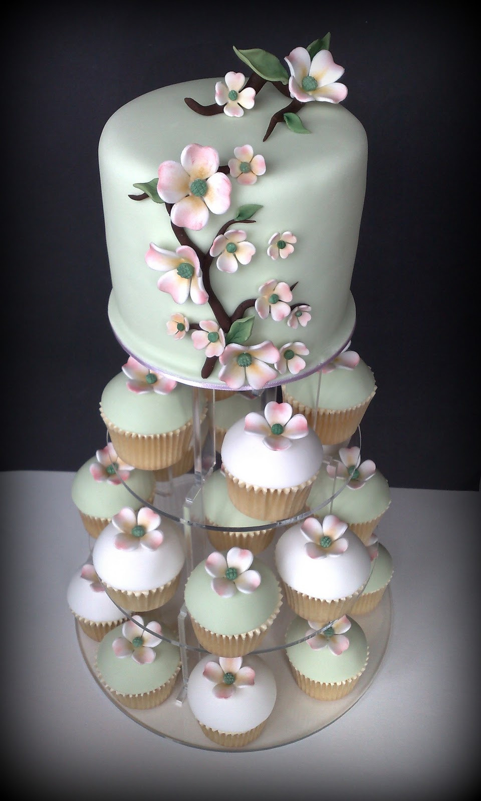 Cup Cake Wedding Cakes
 Small Things Iced Dogwood Wedding Cupcakes & Cutting Cake