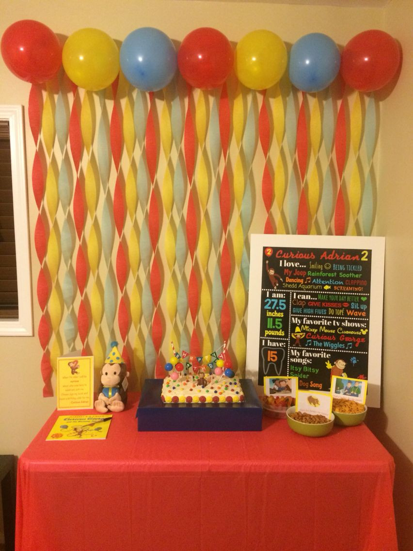 Curious George Birthday Decorations
 Curious George birthday party cake table