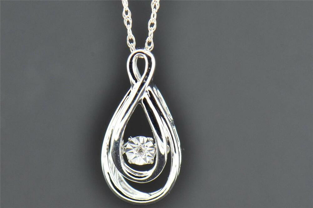 Dancing Diamond Necklace
 Solitaire Dancing Diamond Pendant Sterling Silver Round