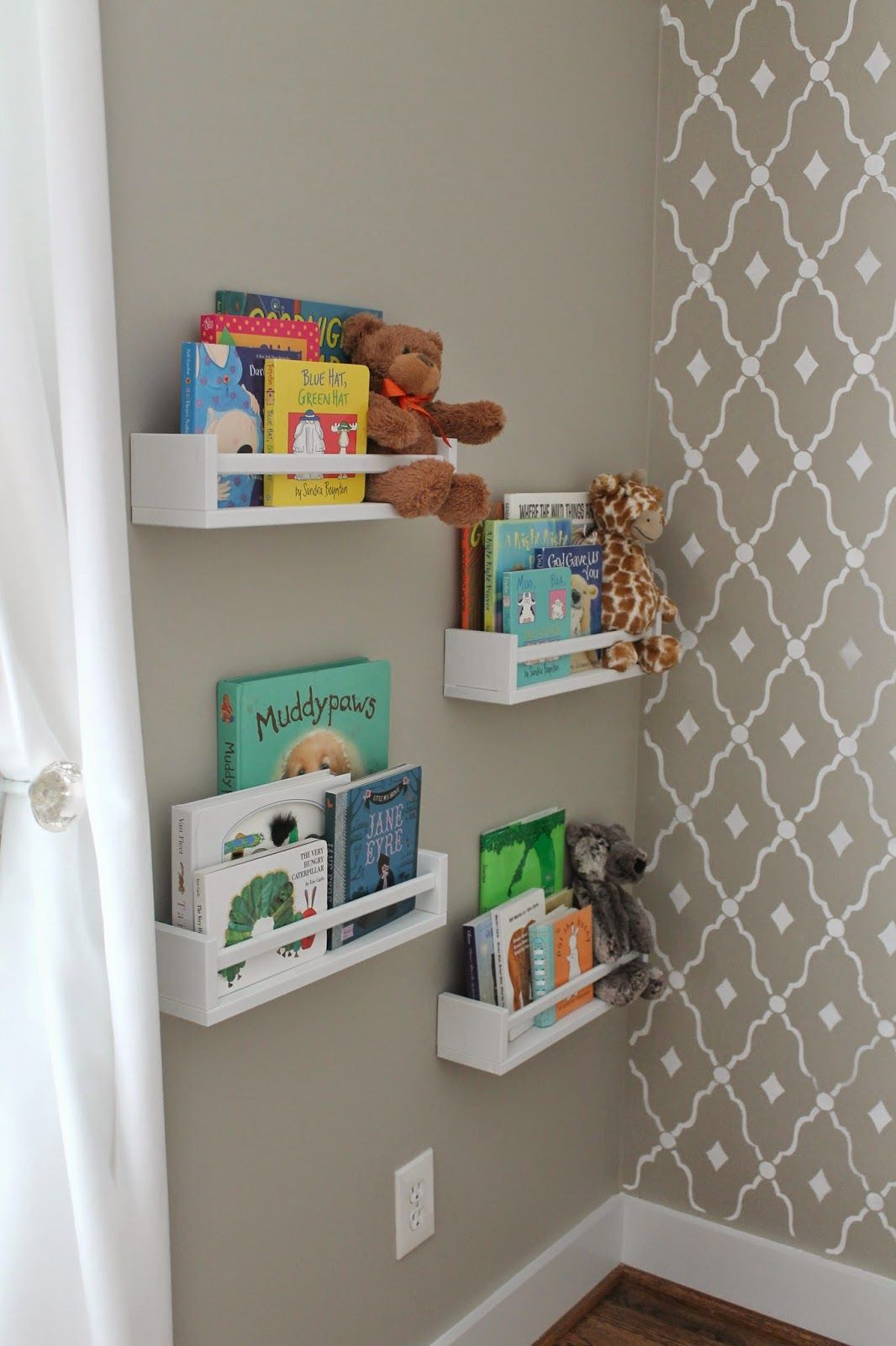 DIY Baby Bookshelf
 Ikea spice racks used as bookshelves