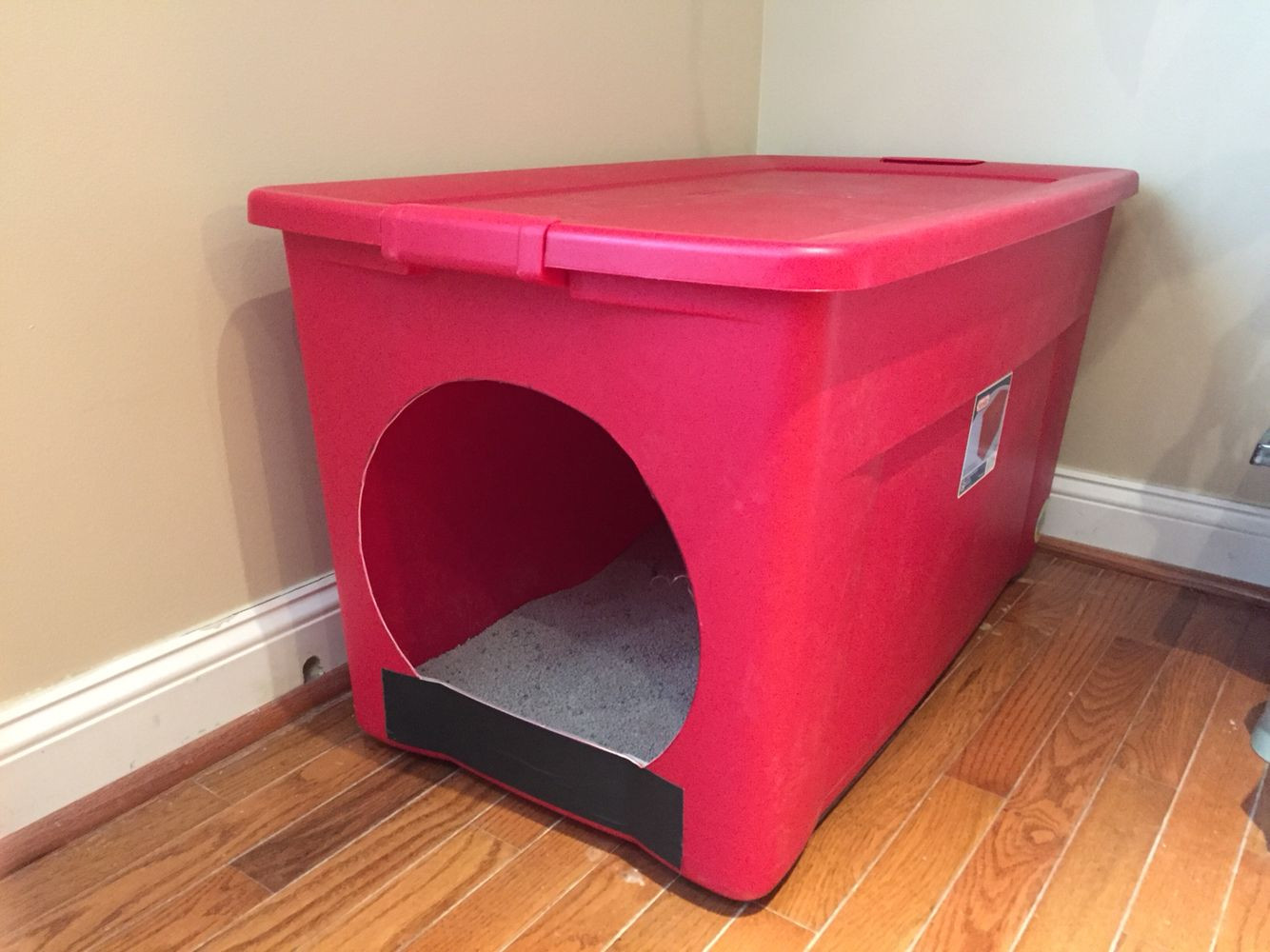 DIY Dog Litter Box
 Homemade litter box from a large storage container Made