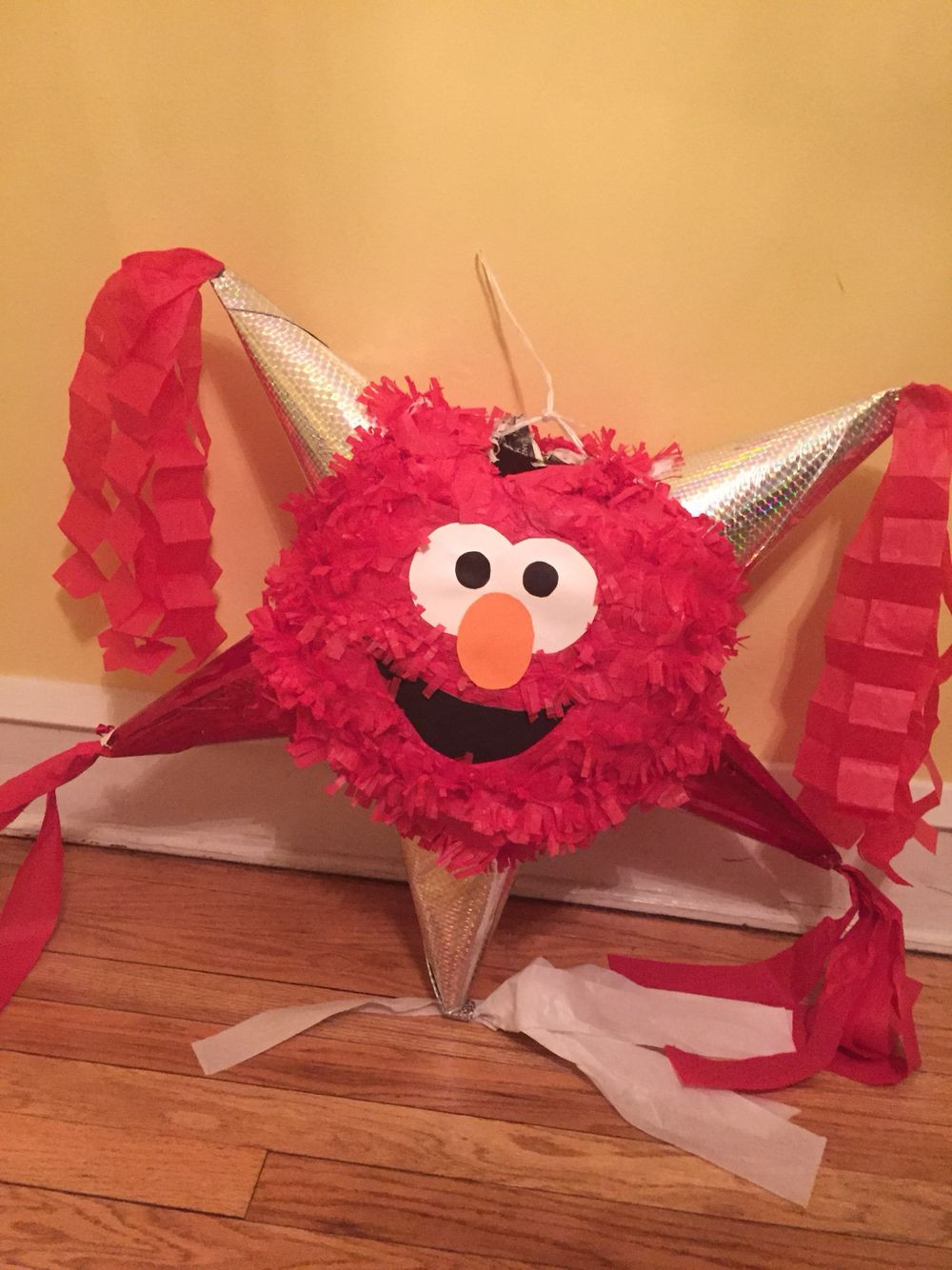 DIY Elmo Decorations
 DIY Elmo piñata Sesame Street 1st bday party