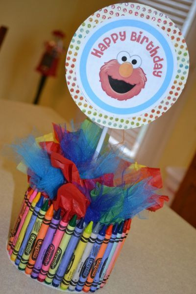 DIY Elmo Decorations
 Elmo centerpiece made using crayons tissue paper and