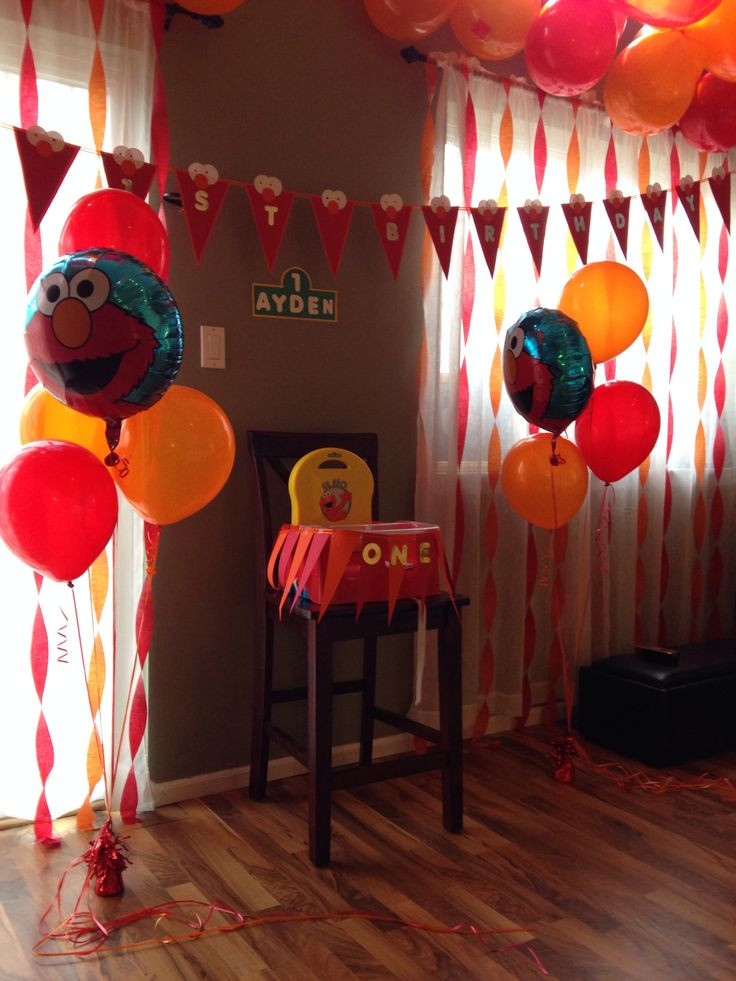 DIY Elmo Decorations
 Elmo birthday party balloons decorations high chair one