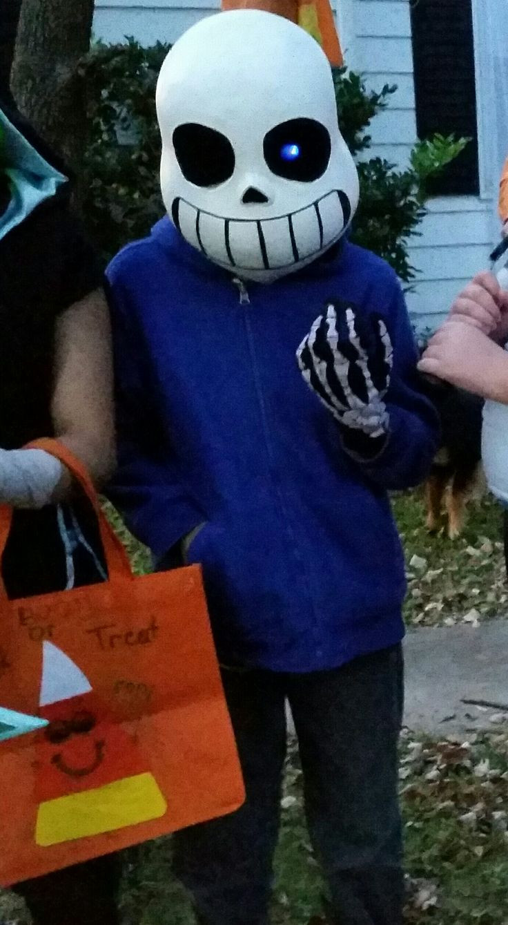 DIY Sans Mask
 The finished Sans costume with gloves from Party City