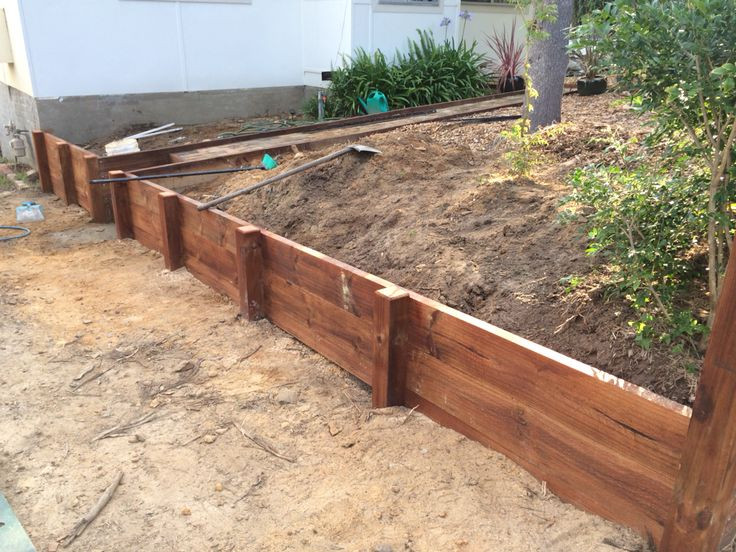 DIY Wooden Retaining Wall
 DIY timber retaining wall in the making Treated pine