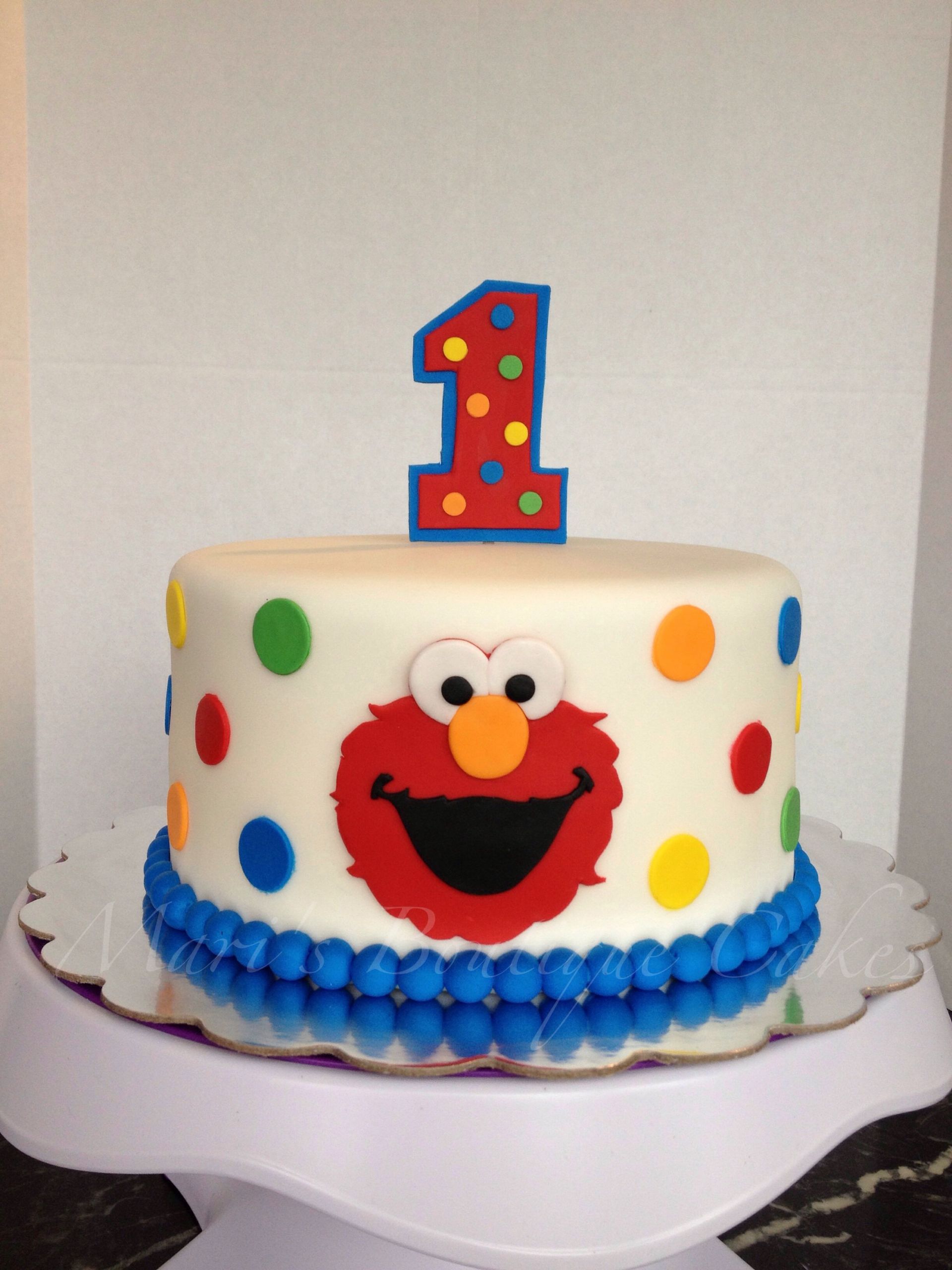 Elmo 1st Birthday Cake
 Elmo 1st birthday cake by Mari s Boutique Cakes
