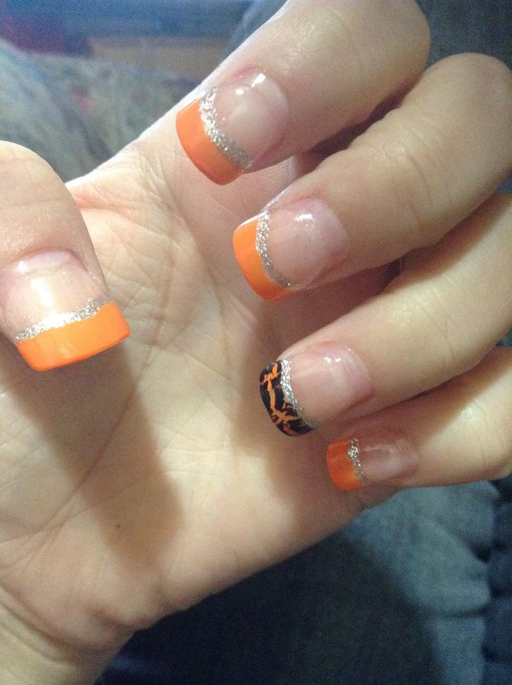 Fall French Tip Nail Designs
 Orange French tips with black Crackle accent nail and