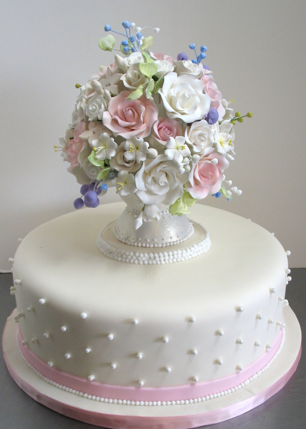 Fancy Birthday Cakes
 White cake with sugar vase