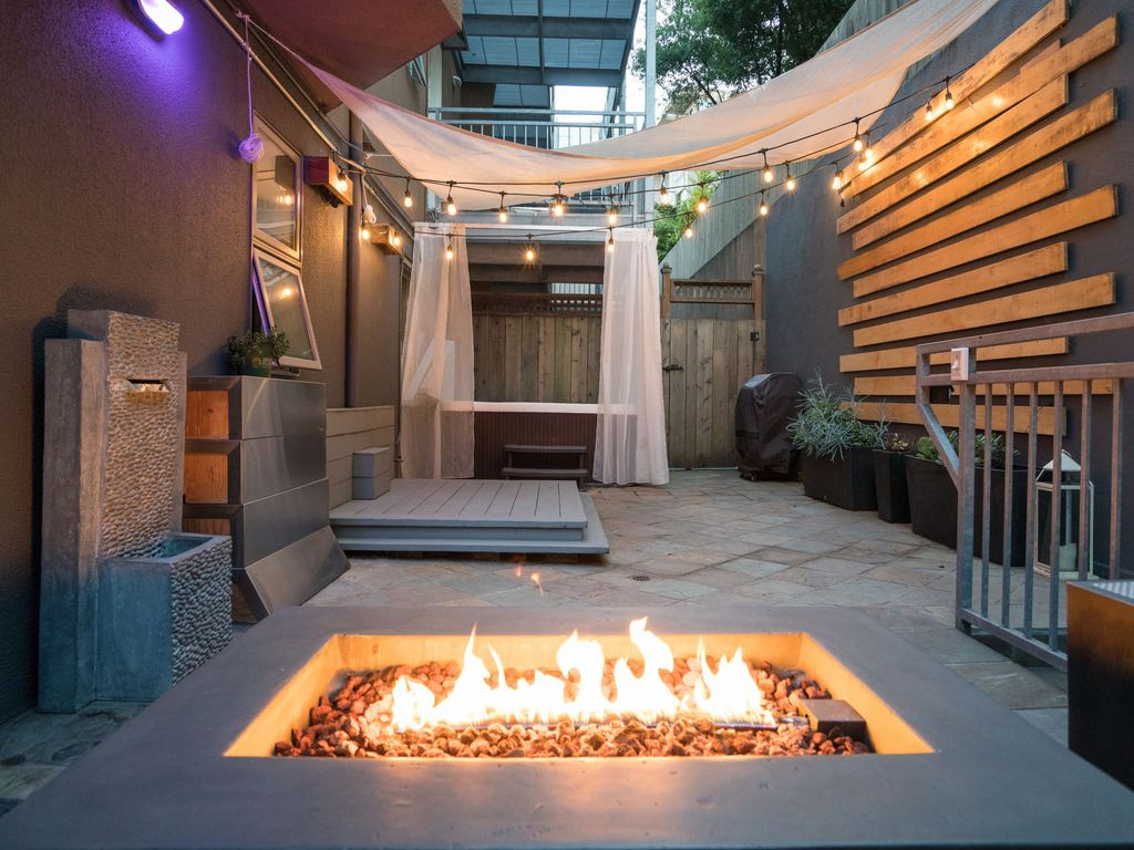 Fire Pit Apartment Balcony
 Modern unit w Private patio Hot tub Fire pit Free