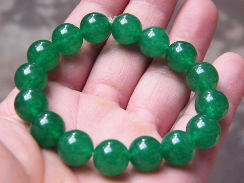 Green Jade Bracelet
 Natural green jade bead bracelet with 12 mm emerald