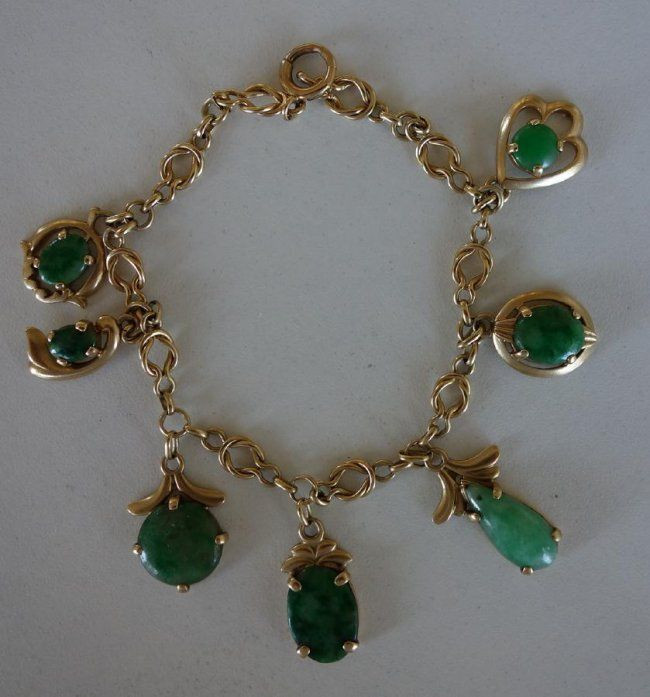 Green Jade Bracelet
 A Chinese green Jadeite Jade & 14K gold charm bracelet