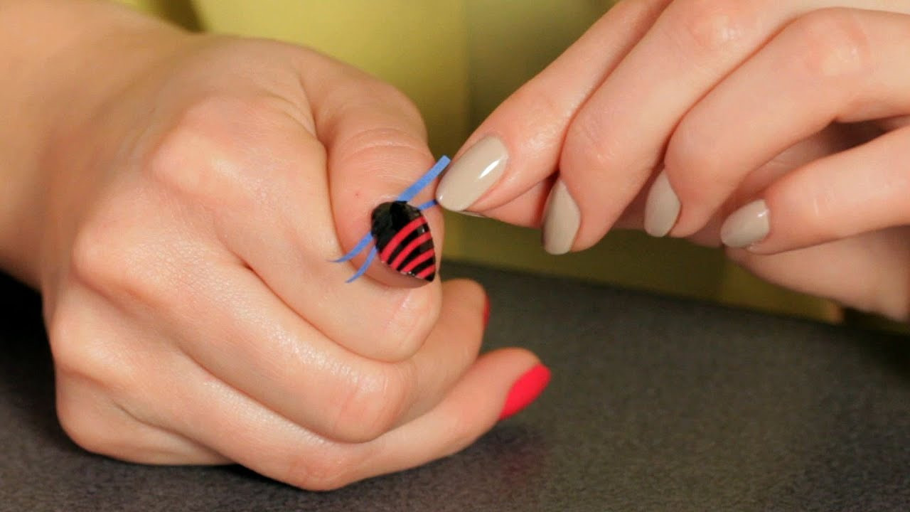 How To Nail Designs
 How to Do a Stripe Design with Tape