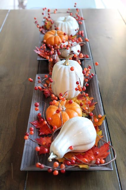 Inexpensive Thanksgiving Table Decorations
 Grab some cheap pumpkins from the dollar store and craft a