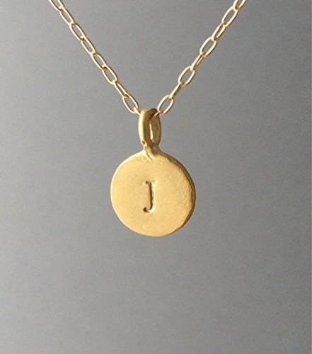 Initial Disc Necklace
 Amazon Small Gold Stamped Initial Disc Necklace also