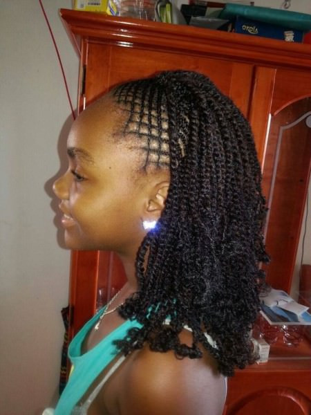 Kids Twist Hairstyle
 Kinky Twist With Intricate Braids At The Front Black