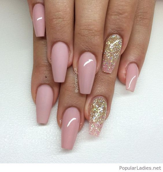 Light Pink Nails With Gold Glitter
 Long pink nails with gold glitter
