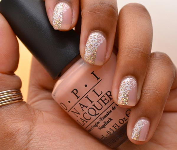 Light Pink Nails With Gold Glitter
 12 Pretty and Shiny Gold Nail Designs